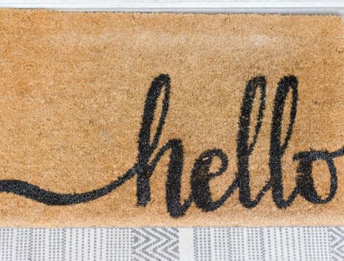 Door mat with Hello written on it